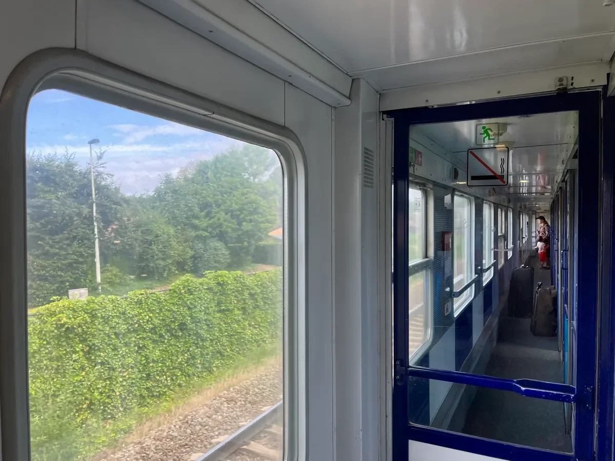 Train passengers are preparing for their arrival in Brussels. Photo: Daria Kozlova